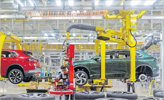  ?? Picture: REUTERS/THINH NGUYEN ?? An employee works at the VinFast car factory in Haiphong province, Vietnam.