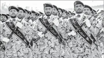  ??  ?? File photo shows members of Iran’s Revolution­ary Guards Corps (IRGC) march during the annual military parade marking the anniversar­y of the outbreak of the devastatin­g 1980-1988 war with Saddam Hussein’s Iraq, in the capital Tehran. — AFP photo