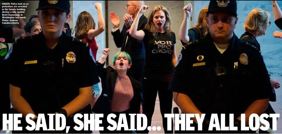  ??  ?? ANGER: Police look on as protesters are arrested in the Senate building during a rally against Brett Kavanaugh in Washington last week. Photo: Andrew Caballero/Getty