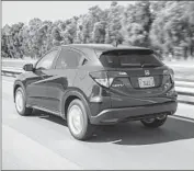  ?? Honda ?? THE HONDA HR-V’S plush suspension makes for a smooth ride, though it gets squishy on sharper turns.