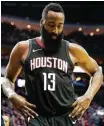  ?? Marie D. De Jesús / Houston Chronicle ?? James Harden heads to the locker room near the end of the fourth quarter Sunday night with a strained right hamstring that kept him from returning for the two overtimes in a win over the Lakers.