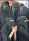  ?? HASSAN AMMAR/ THE ASSOCIATED PRESS ?? Saudi women attend the traditiona­l Arda dance, or War dance, during the Janadriyah Festival of Heritage and Culture on the outskirts of the Saudi capital Riyadh, Saudi Arabia.