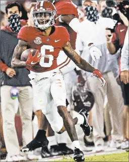  ?? MICKEY WELSH/AP ?? WR DeVonta Smith and the Alabama offense have put up big numbers this season.