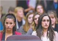  ?? MATTHEW DAE SMITH/LANSING STATE JOURNAL VIA AP ?? Former Olympians Aly Raisman, left, and Jordyn Wieber sit Friday in Circuit Judge Rosemarie Aquilina’s courtroom in Lansing, Mich., during the fourth day of sentencing for former sports doctor Larry Nassar, who pled guilty to multiple counts of sexual...