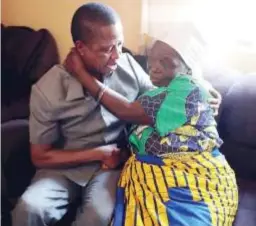  ??  ?? President Lungu hugs his mother Ekelis in Petauke