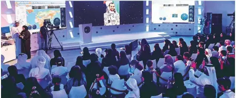  ?? Ahmed Ramzan/Gulf News ?? Emirati Astronaut Hazzaa tells UAE students about his daily routine in a live radio call between between Mohammad Bin Rashid Space Centre and the Internatio­nal Space Station yesterday. The radio call lasted 10 minutes.