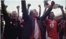  ?? Photograph: Allsport Msi/Allsport ?? Tommy Docherty at the centre of Manchester United’s celebratio­ns after winning the 1977 FA Cup final 2-1 against Liverpool.