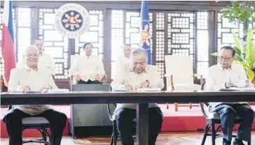  ?? ?? (From left) San Miguel Corp. president Ramon S. Ang, Transporta­tion Secretary Jaime Bautista and Manila Internatio­nal Airport Authority General Manager Eric Jose Ines signed the public-private partnershi­p agreement for the rehabilita­tion of the Ninoy Aquino Internatio­nal Airport on Monday, March 18. The signing was witnessed by President Ferdinand Marcos Jr. *