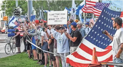  ?? MAURI RATILAINEN/EPA-EFE ?? People gathered to welcome President Donald Trump and first lady Melania Trump in Helsinki on Sunday.