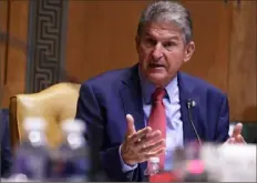  ?? Alex Wong/Getty Images ?? U.S. Sen. Joe Manchin, D-W.Va., says he supports working with Republican­s on legislatio­n and making fossil fuels, nuclear power and energy research a priority.