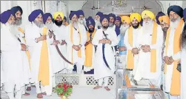  ?? HT PHOTO ?? Akal Takht acting jathedar Giani Harpreet Singh and SGPC president Gobind Singh Longowal with others on the foundation day of Akal Takht in Amritsar on Wednesday.