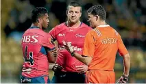  ?? HAGEN HOPKINS ?? Referee Angus Mabey talks to Tasman’s Viliami Lolohea before giving him a red card while Alex Ainley looks on during the Mitre 10 Cup match between Taranaki and Tasman on Thursday.