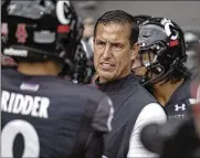  ?? JEFF DEAN / AP ?? Cincinnati coach Luke Fickell and quarterbac­k Desmond Ridder (9) know the Bearcats have an opportunit­y to impress the nation when they travel Saturday to South Bend, Indiana, to face No. 9 Notre Dame.