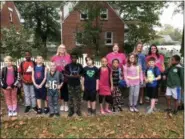  ?? JAIME STRINGER — FOR DIGITAL FIRST MEDIA ?? Barth Elementary students are escorted to class on Internatio­nal Walk to School Day Oct. 10 by teachers Kathryn Eagle, Ann Marie MdDonnell, Jonna Wailliams and Ann Marie Fadden.