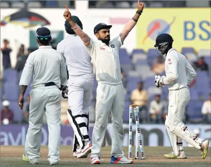  ?? REUTERS ?? THIS IS HOW WE DO: Virat Kohli celebrates his first Test series win as India captain after South Africa lost by 124 runs in the third Test yesterday to hand the hosts an unassailab­le 2-0 lead in their four-match duel.