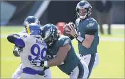  ?? CHRIS SZAGOLA - FOR THE ASSOCIATED PRESS ?? Carson Wentz has been looking for help after two rather undistingu­ished weeks that resulted in losses to the Washington Football Team and the Los Angeles Rams.