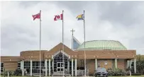  ?? JULIE JOCSAK ?? The Pride flag flies at the head office of Niagara Catholic District School Board in Welland in June 2022.