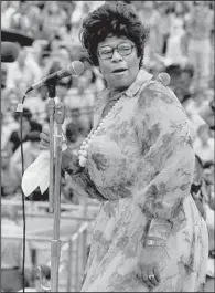  ?? Democrat-Gazette file photo ?? The singer Ella Fitzgerald performs at the Newport Jazz Festival in 1973.