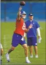  ?? Adam Hunger / Associated Press ?? Giants quarterbac­k Daniel Jones throws during practice Monday.