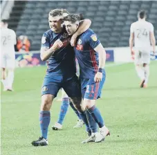  ??  ?? Max Power and Lynden Gooch at end of game MK Dons game.