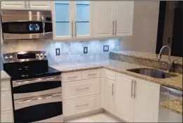  ??  ?? Rancourt Kitchens can save you money by refacing instead of replacing your home’s kitchen and bathroom cabinets.