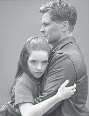  ??  ?? “At the end of the day, this is a movie about a father’s love for a daughter,” says Rob Lowe, who co-stars in “The Bad Seed” with Mckenna Grace. LIFETIME