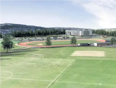  ??  ?? An artist’s impression of the completed Ynys developmen­t, including the new athletics track which will be built on the site of the Michael Sobell Sports Centre