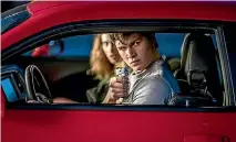  ??  ?? Complicati­ng Baby’s (Ansel Elgort) already troubled situation is the fact that he has fallen in love with Debora (Lily James), a waitress at a local diner.