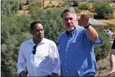  ?? RICK SILVA — PARADISE POST ?? Congressma­n Doug LaMalfa and candidate for governor Larry Elder to Lake Oroville on Sunday, Sept. 5. LaMalfa points out where the farms are, including his that are served by the lake.