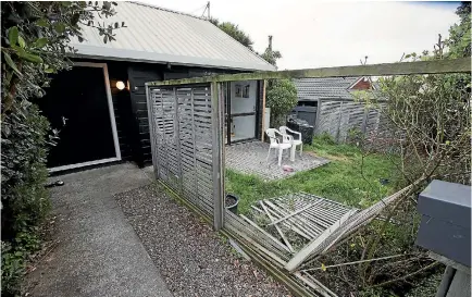  ?? PHOTO: KEVIN STENT/FAIRFAX NZ ?? After smashing through Jo Alderdice’s fence, an alleged abductor attempted to barge the front door down.