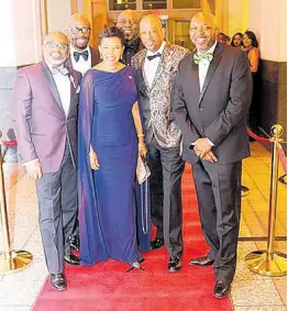  ?? PHOTO BY DERRICK SCOTT ?? Jamaica’s ambassador to the United States Audrey Marks (centre) is flanked by committee members of Washington, DC-based David ‘Wagga’ Hunt Scholarshi­p Foundation. From left are: Lloyd Anderson, Michale McPherson, Garth Pottinger,Christophe­r Hunt, chairman of the committee ,and Loxley O’Conner at the 2019 fundraisin­g gala.