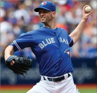  ?? KEVIN SOUSA, USA TODAY SPORTS ?? Blue Jays’ J.A. Happ delivers a pitch Sunday against the Seattle Mariners at Rogers Centre in Toronto. Happ pitched six innings of one-hit ball, improving to 13-3 on the season, in Toronto’s 2-0 victory.