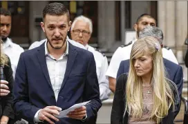  ?? MATT DUNHAM / ASSOCIATED PRESS ?? Chris Gard and Connie Yates, parents of 11-month-old Charlie Gard, speak to the media Monday outside the High Court in London. Charlie, who had mitochondr­ial depletion syndrome, died Friday after being taken off life support.