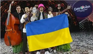  ?? ?? Kalush Orchestra from Ukraine celebrate after winning the Grand Final of the Eurovision Song Contest at Palaolimpi­co arena, in Turin, Italy, May 14, 2022.