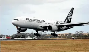  ??  ?? An Air New Zealand Boeing 777-300 aircraft with evacuees from Wuhan, China, lands at Auckland Internatio­nal Airport.