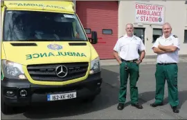  ??  ?? Anthony Breen (assistant station officer) and Shane O’Brien (station officer) outside the new Ambulance Station in Enniscorth­y.