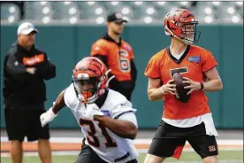  ?? JOHN MINCHILLO / AP ?? Rookie quarterbac­k Ryan Finley had a disappoint­ing offseason with the Cincinnati Bengals, frequently missing receivers and making wobbly throws.