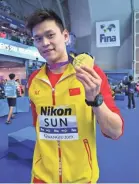  ?? ED JONES/AFP/GETTY IMAGES ?? China’s Sun Yang, who has served a doping ban, won the 200-meter freestyle Tuesday.