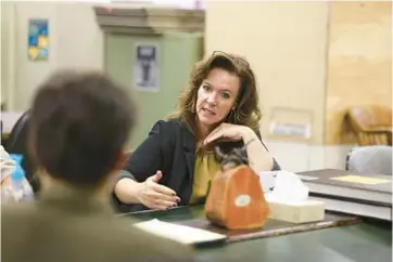  ?? ?? Boone County Clerk Julie Bliss speaks inside the clerk’s office in Belvidere.