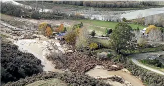  ?? TASMAN DISTRICT COUNCIL ?? An aerial photo shows the damage to the property belonging to Clare James’s brother in 2010.