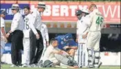  ?? AFP ?? Dean Elgar after he was hit by a bouncer from Umesh Yadav.