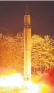  ??  ?? DANGER North Korea missile launch in July