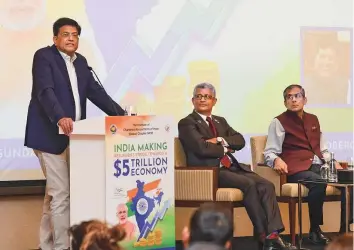  ?? Virendra Saklani/Gulf News ?? Piyush Goyal, Indian Minister of Commerce & Industry, speaks at an event in Dubai yesterday. Also seen are Indian Ambasador to the UAE Pawan Kapoor (right) and Sundar Nurani, chairman, ICAI Dubai Chapter, NPIO.