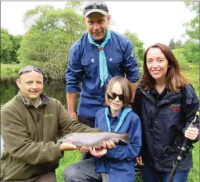  ??  ?? Oisin Cahill of the Dublin Angling Initiative with Shane Brady (13) from Roundwood Scouts, Sinead Hurson and leader Weslie from Roundwood Scouts.