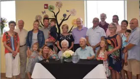  ?? MARIAN DENNIS — MEDIANEWS GROUP ?? Chester and Martha Pish, center, are joined by their family at the TriCounty Active Adult Center Friday in celebratio­n of 77 years of marriage.