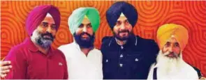  ?? - PTI ?? FORMAL ANNOUNCEME­NT: A photo of the new political front launched by former MP Navjot Singh Sidhu, second right, in Amritsar on Friday. Pargat Singh and Bains brothers are also seen.