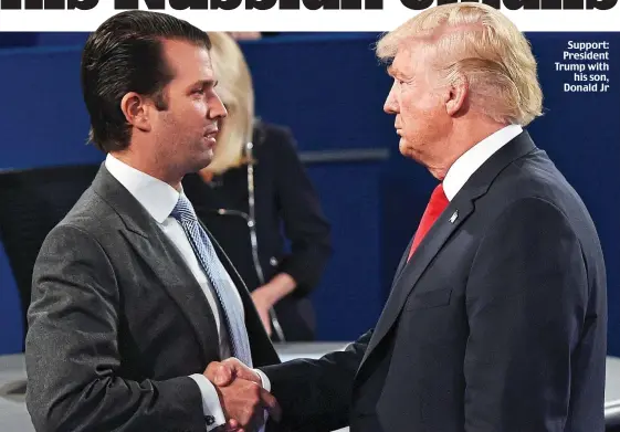  ??  ?? Support: President Trump with his son, Donald Jr