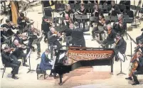  ?? JAG GUNDU ?? Vikingur Olafsson at the piano and Daniel Bjarnason conducting the Toronto Symphony Orchestra at Roy Thomson Hall.