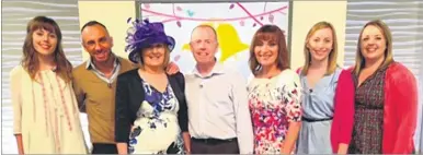  ??  ?? Gail Arnold, third from left, with family, Lorraine Kelly and fashion presenter Mark Heyes