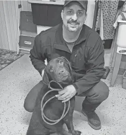  ?? PIKE PET PALS COURTESY ?? Tom Hall with Bailey, a brown Labrador retriever who was recently recovered after disappeari­ng four years ago in Pike County.